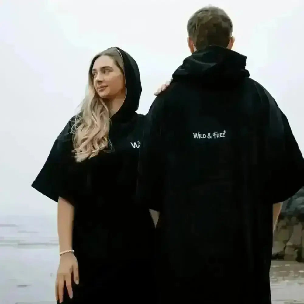 Black hooded towel robe with Wild and Free logo design