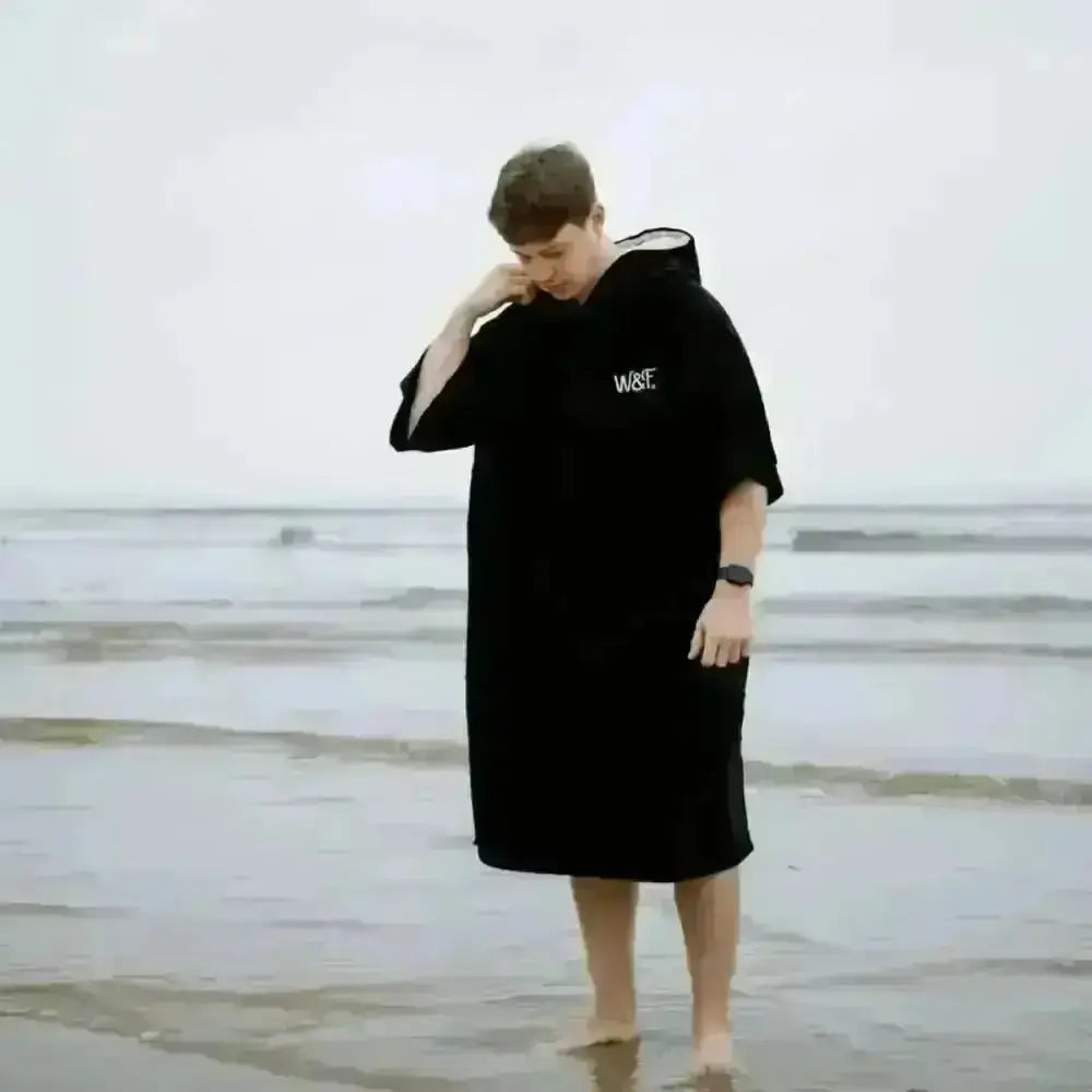 Black hooded towel robe with wave text on chest