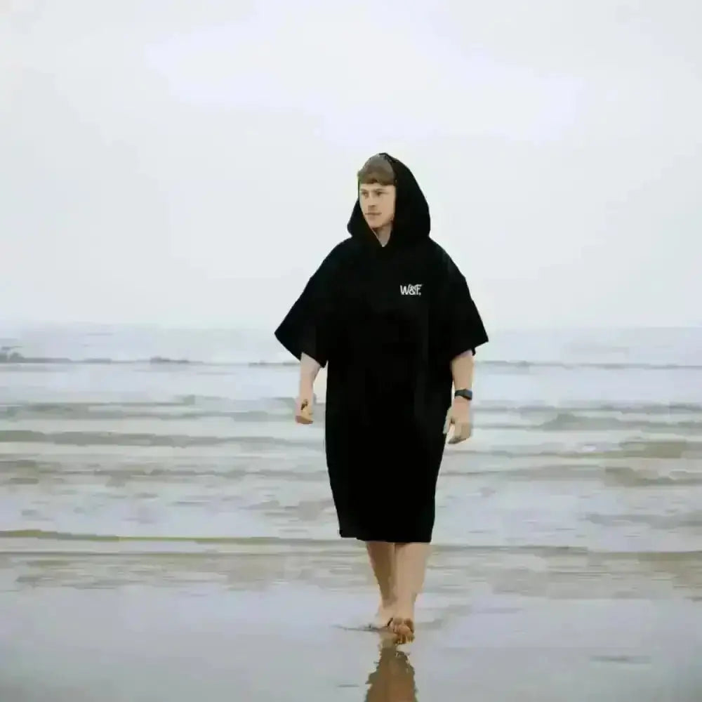 Black hooded towel robe poncho with wave logo on front