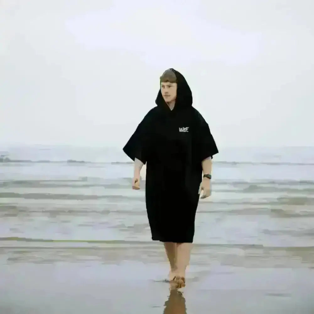 Black hooded towel robe poncho with wave logo on front