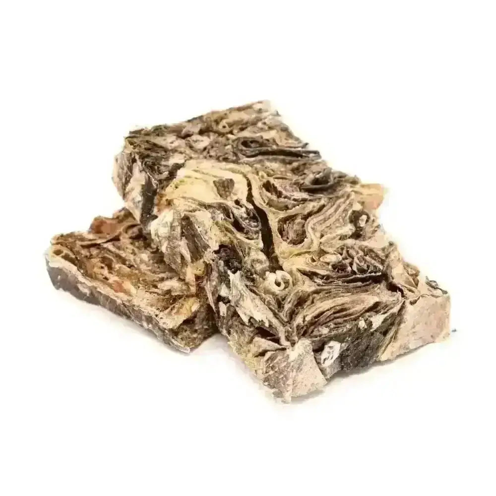 Brown and black textured Mighty Fish Chew soap bar with colorful swirls