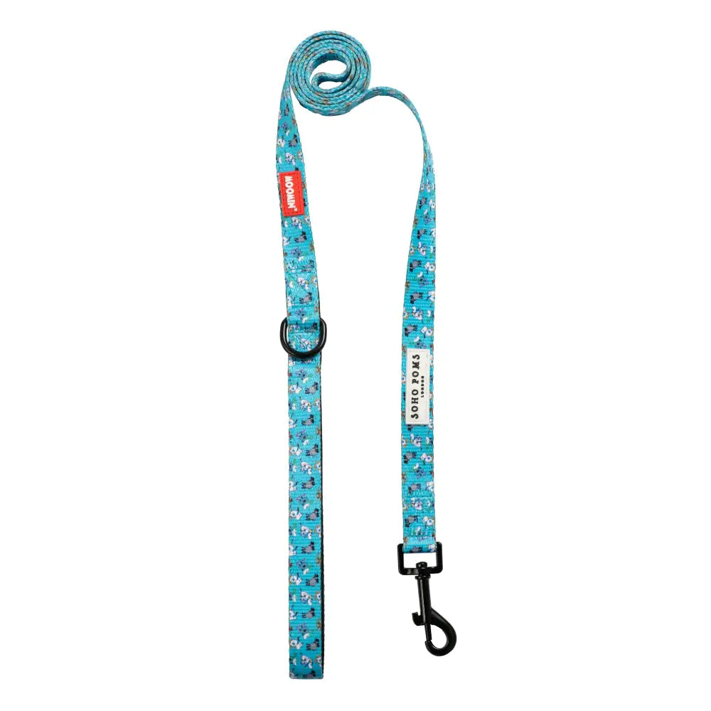 Blue holiday dog lead with paw prints, black hardware, and Bark & Wag label