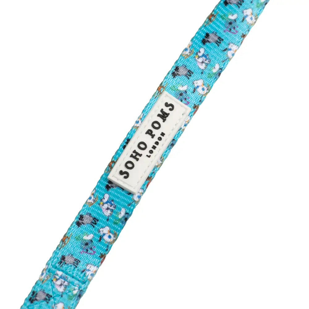Blue floral Moomins Blue Holiday dog leash with Soho Poms label for stylish walking