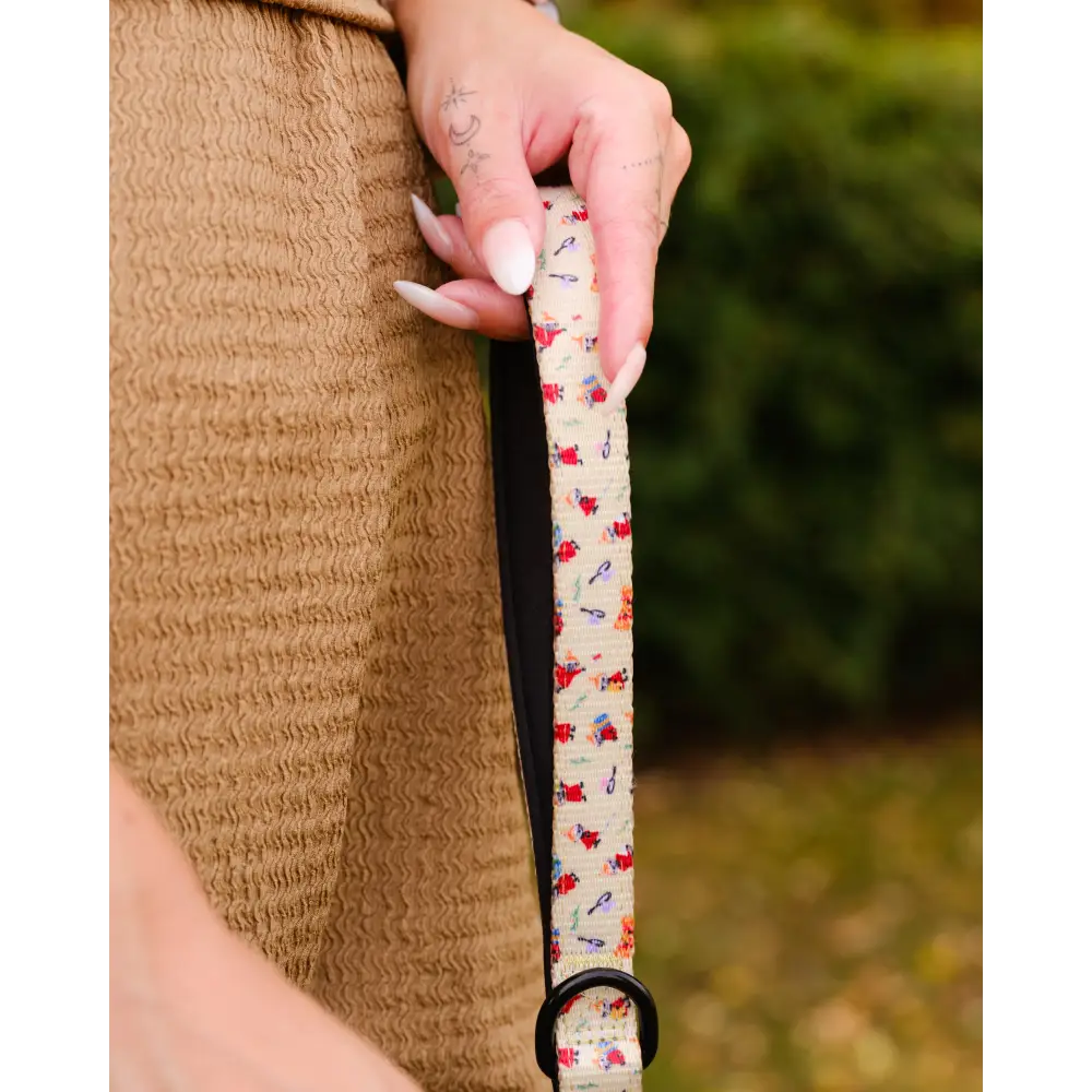 Beige and red floral dog leash with black hardware from Moomins Yellow Sunrise collection