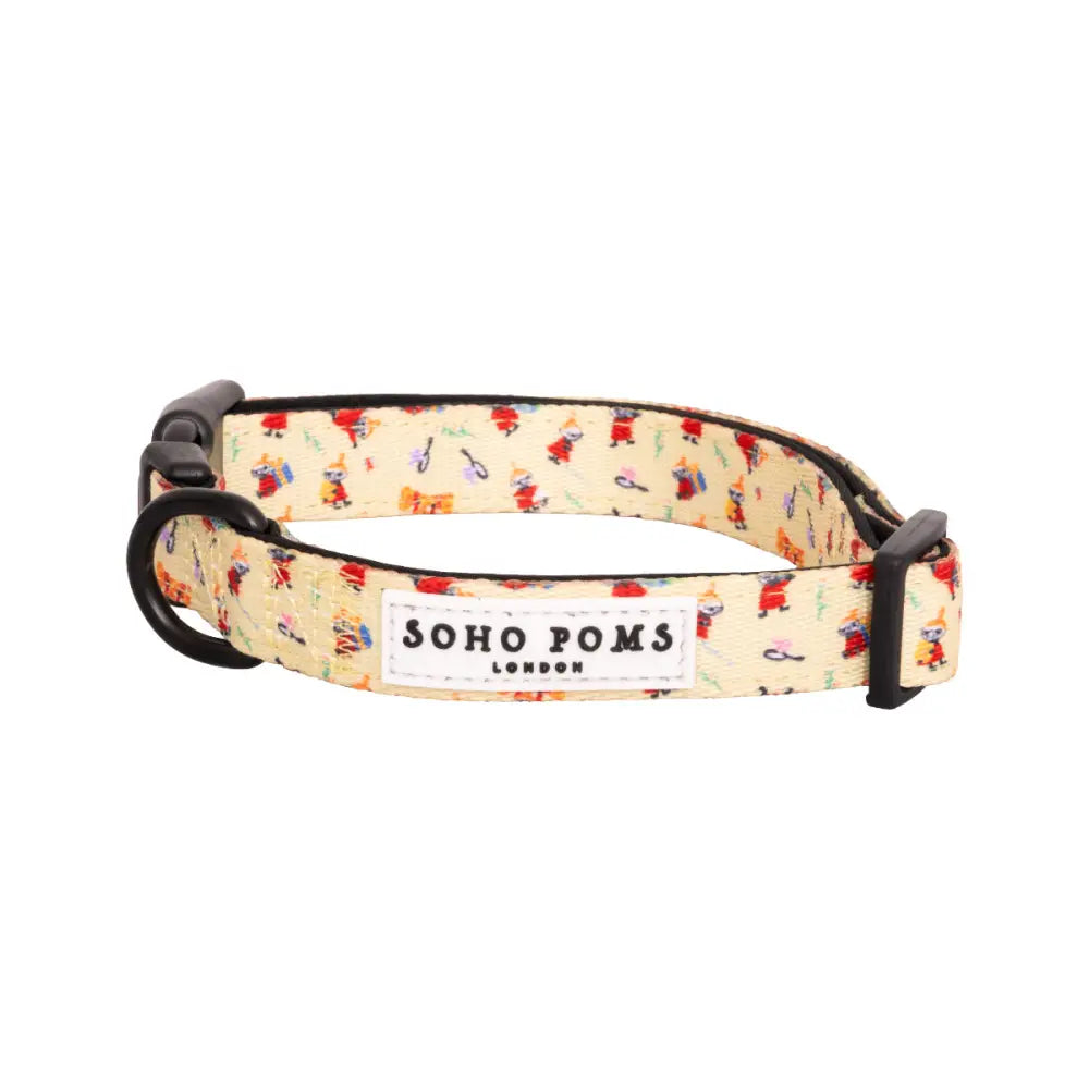 Cream-colored Soho Poms Moomins Yellow Sunrise dog collar with playful red and blue pattern