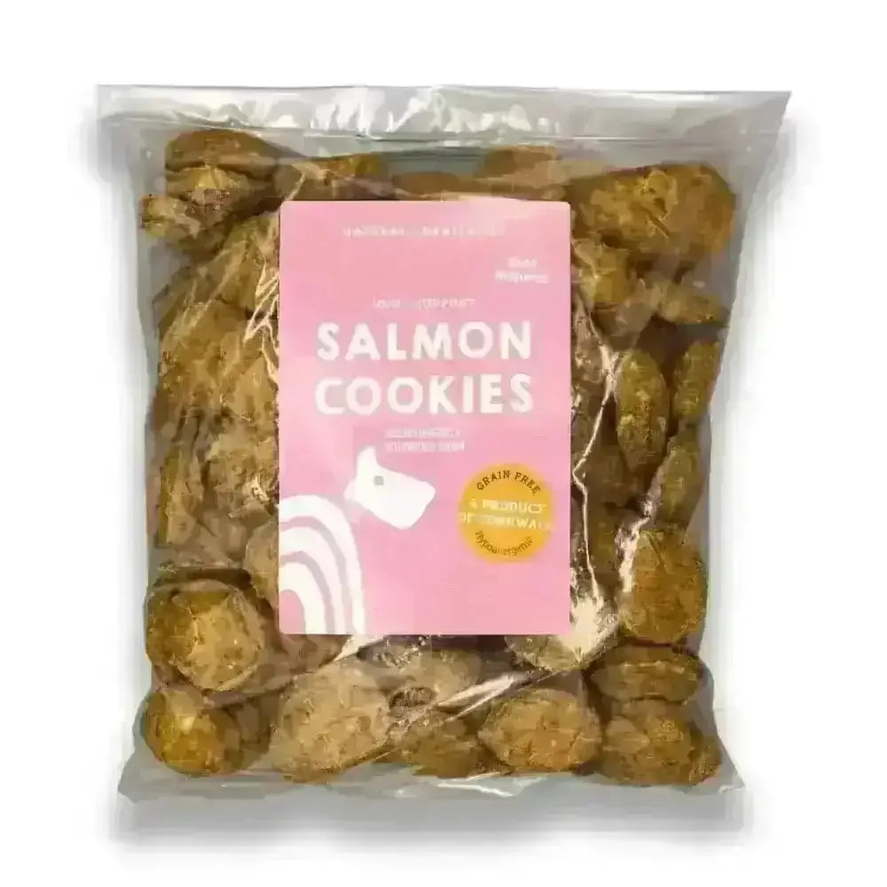 Salmon cookies in clear plastic bag with pink label and white dog logo for natural dog treats