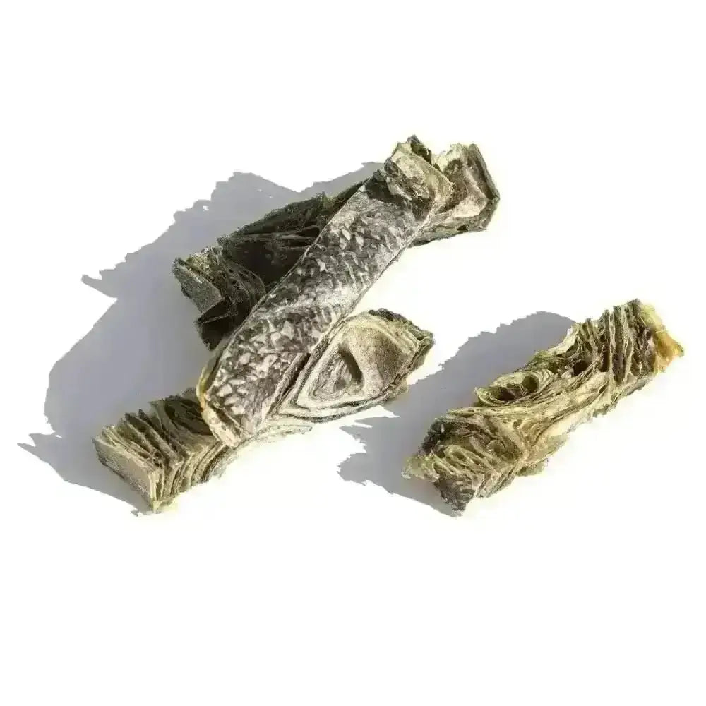 Dried seaweed snack sticks with green and brown hues, part of Natural Cornish Whitefish Fingers