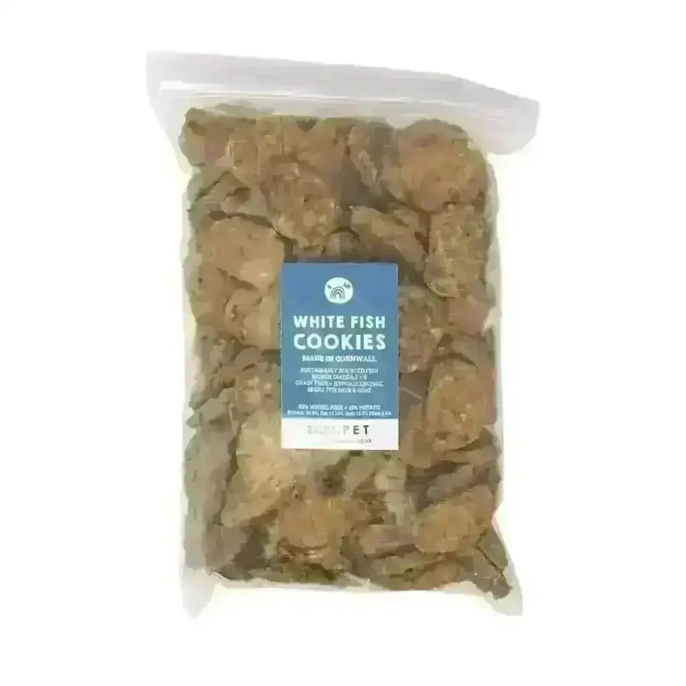 Natural Cornish Whitefish and Potato Cookies for dogs in clear packaging with blue label