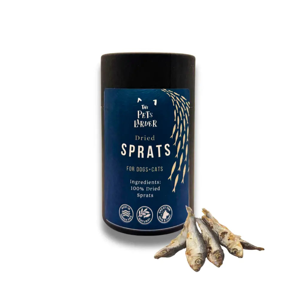 Blue cylindrical container of natural dried sprats for dogs as meal topper