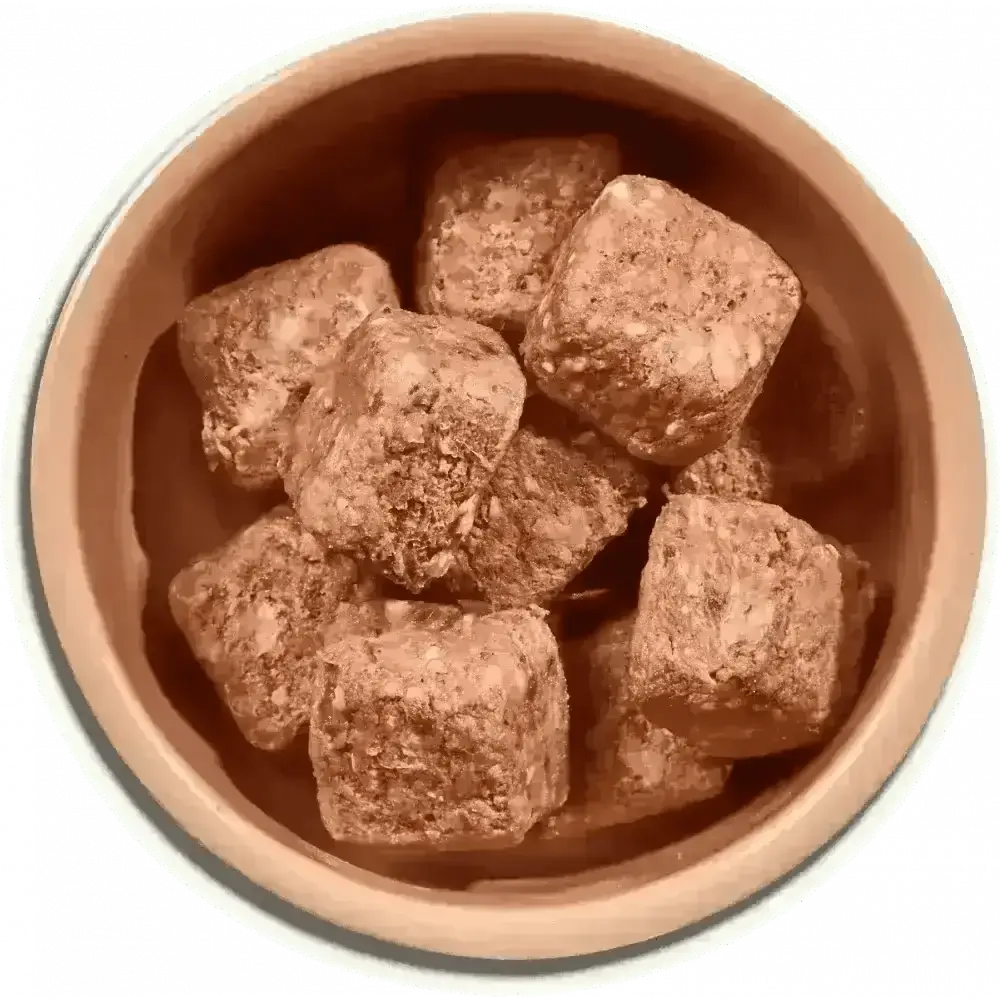 Brown ceramic bowl of Natures Menu beef chicken dog food nuggets with brown rice