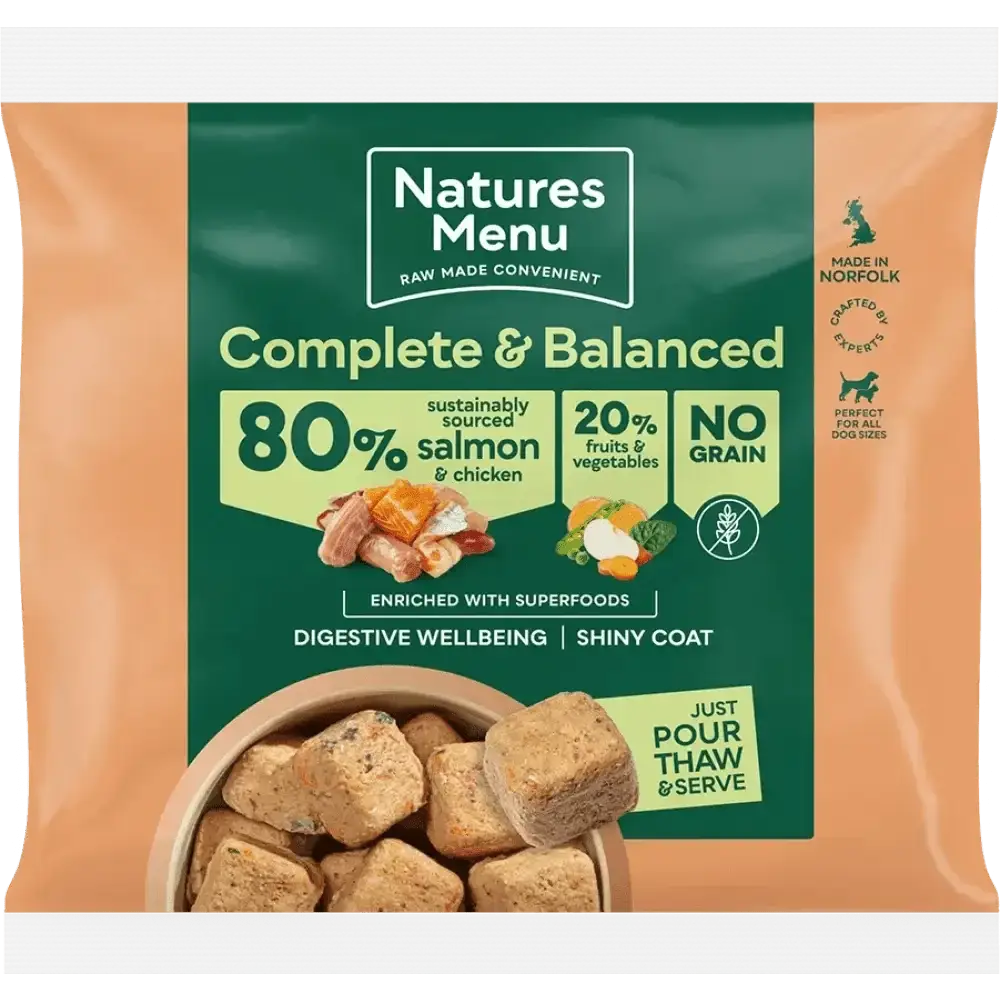 Natures Menu complete and balanced dog food pouch with salmon and chicken, green label