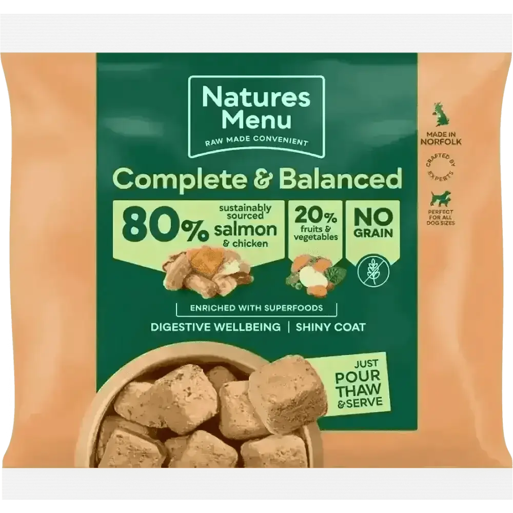Natures Menu complete and balanced dog food pouch with salmon and chicken, green label