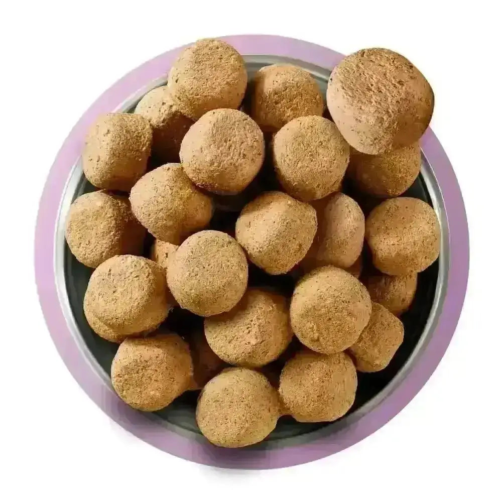 Natures Menu freeze dried turkey dog food in a bowl on a white background