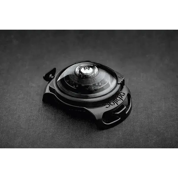 Black and silver Adidas lens cap for Orbiloc Dog Dual Safety Light