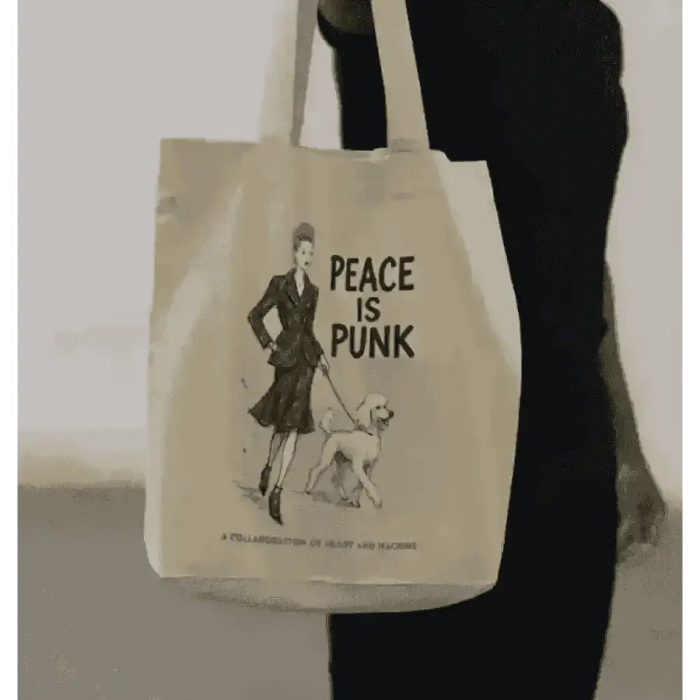 Vivienne Westwood inspired peace is punk canvas tote bag with woman walking dog design