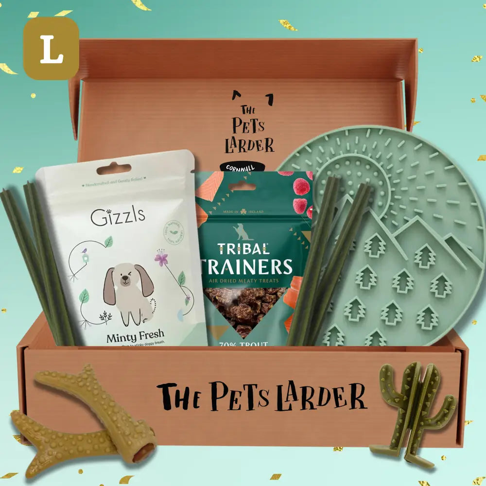 The Pets Larder monthly treat box with gizzls minty chews and tribal trainers treats