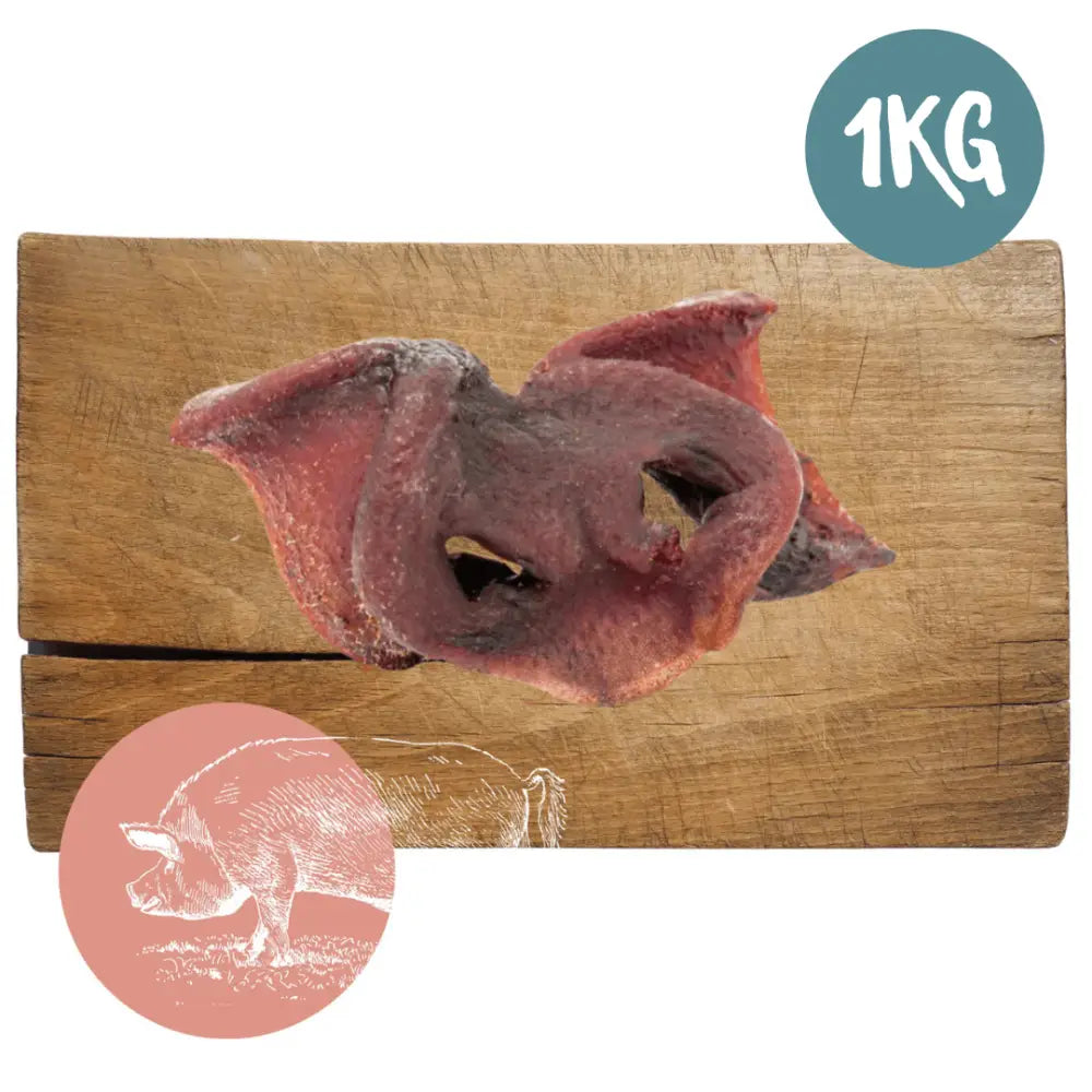 1kg bag of air-dried pork snouts for dogs on wooden board