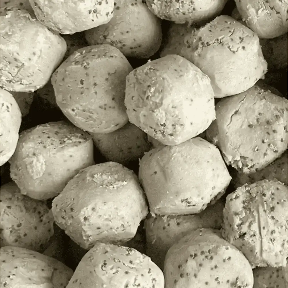 Eco-friendly bird food: rustic white speckled nutritious fat balls for wild birds