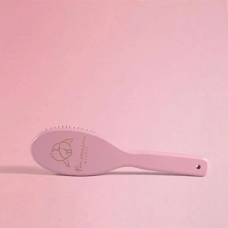 Pastel pink Pomeranian Beauty Rose Gold Grooming Brush with cat design and handle
