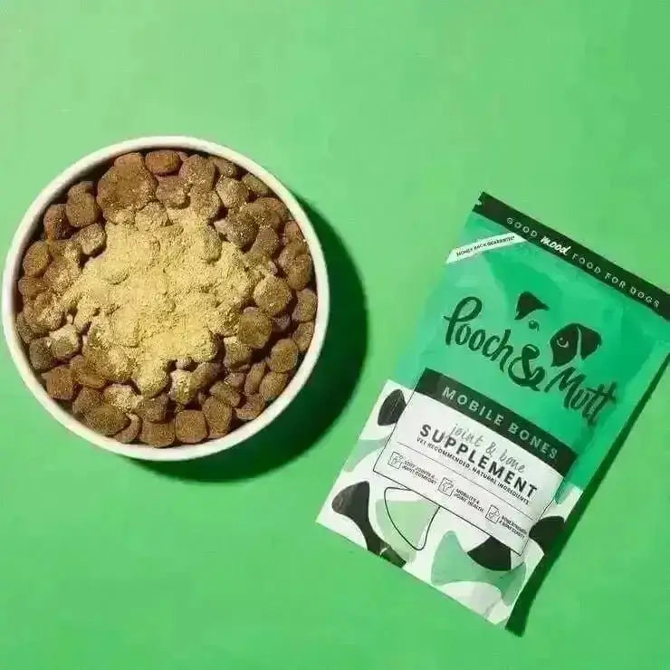 Pooch & Mutt Mobile Bones 200g: dog bowl with kibble, powder, and green bag