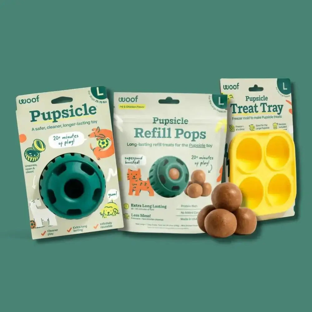 Woof Pupsicle dog enrichment starter pack with green ball and yellow treat tray