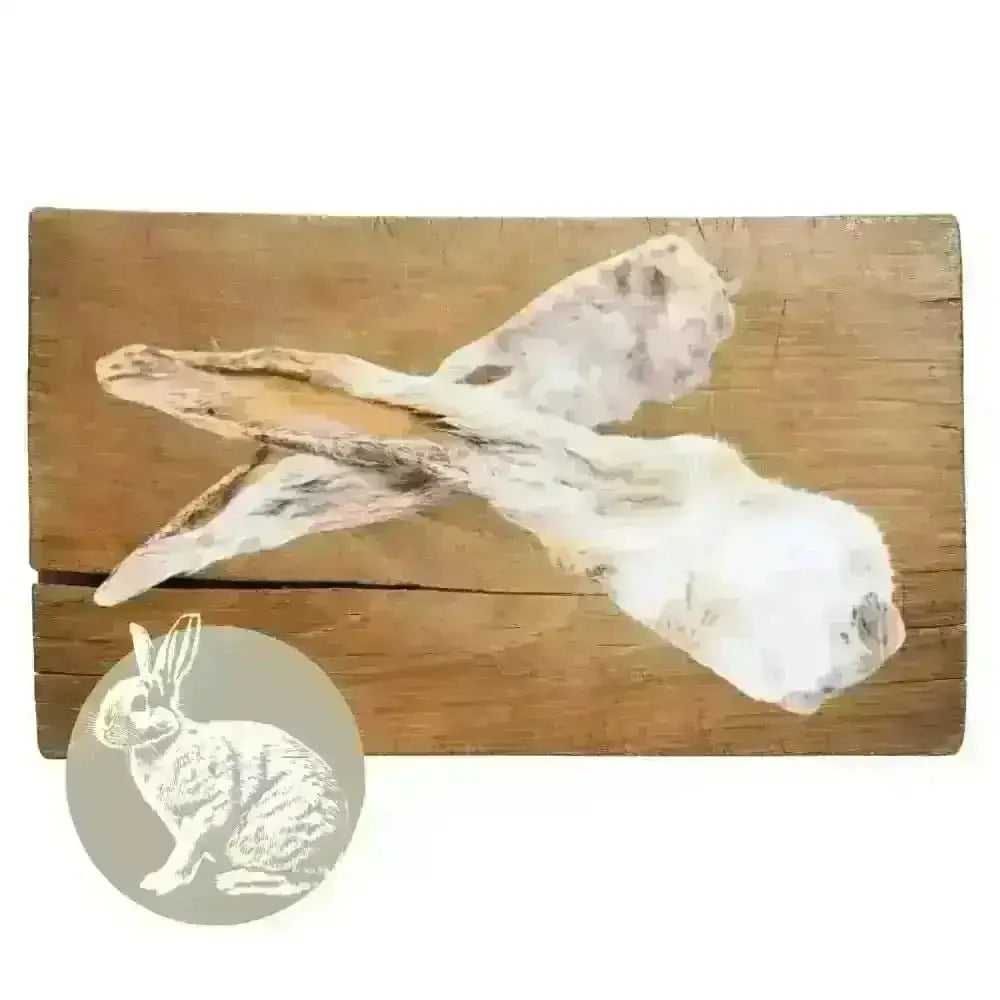 Wooden cutting board with rabbit ear and tail design for natural dog chew from Pets Larder