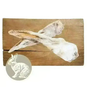 Wooden cutting board with rabbit ear and tail design for natural dog chew from Pets Larder
