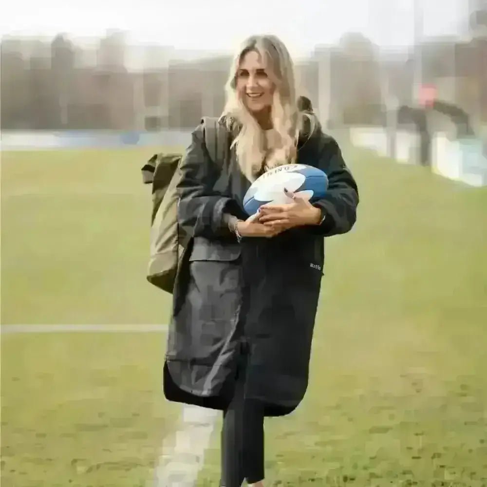 Black Cobe changing robe parka with hood, zipper, and rugby ball