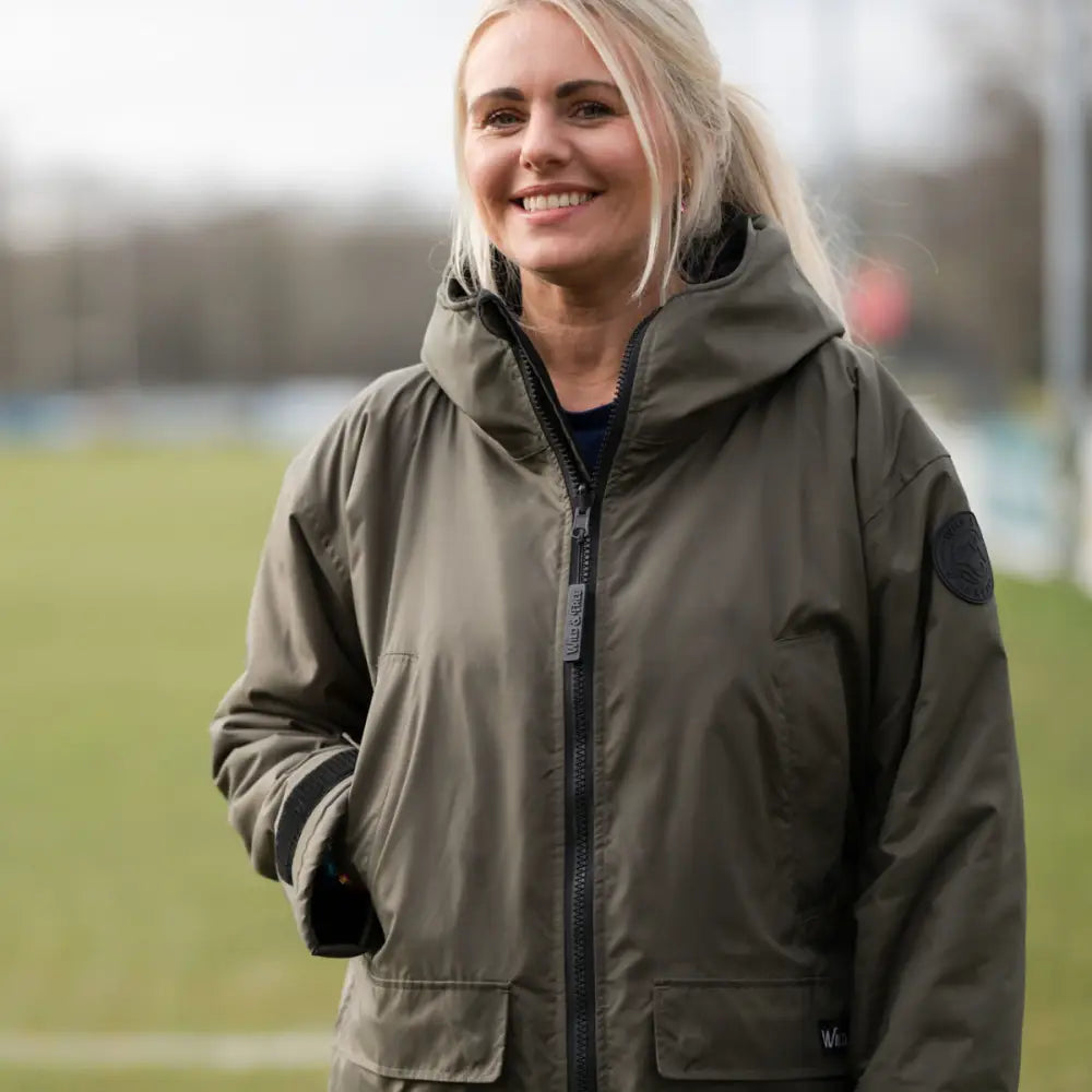 Olive green changing robe hooded jacket with black zipper and pockets