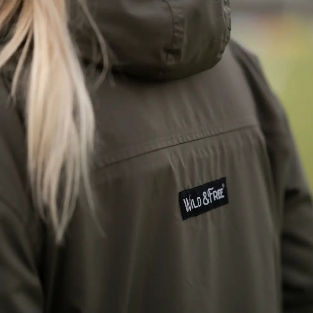 Olive green hooded changing robe jacket with wild and free patch