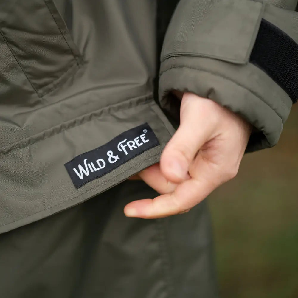 Olive green changing robe jacket with wild and free lining label