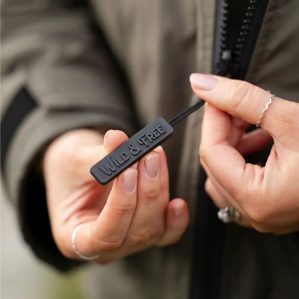 Black leather wild and free keychain with silver hardware for changing robe