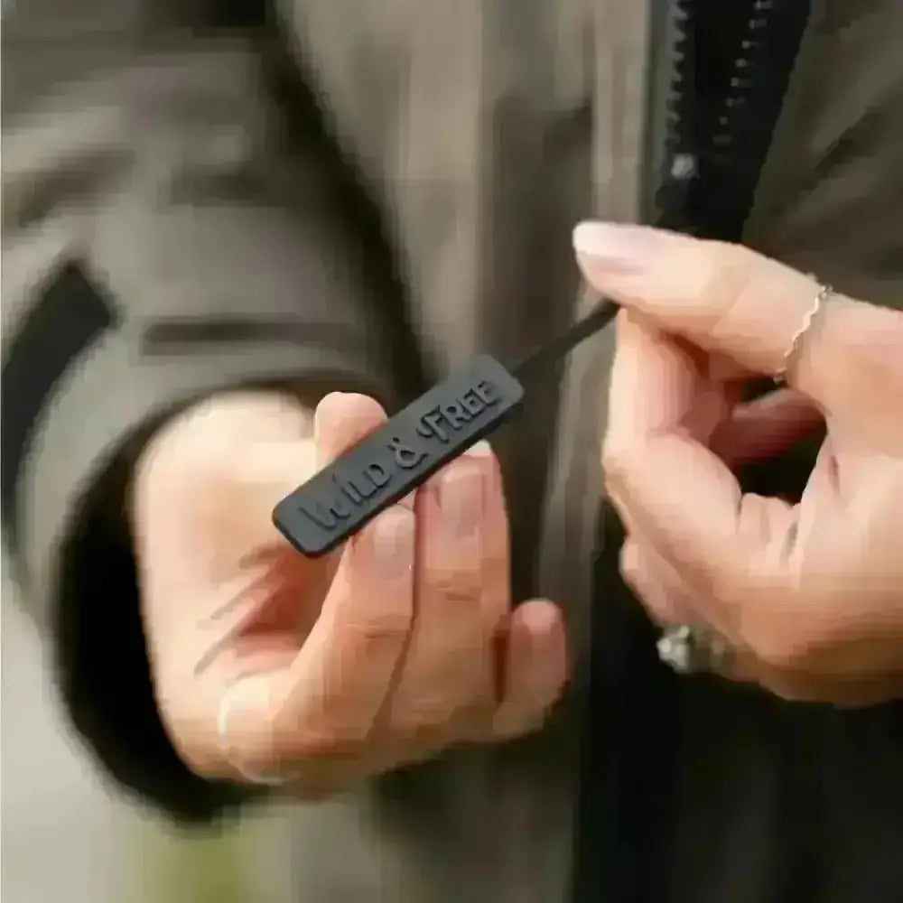 Black leather wild and free keychain with silver hardware for changing robe