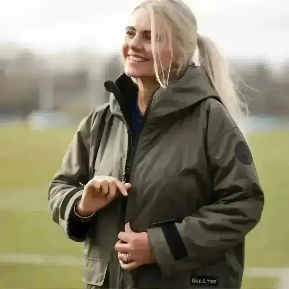 Olive green hooded changing robe jacket with black accents and durable fabric