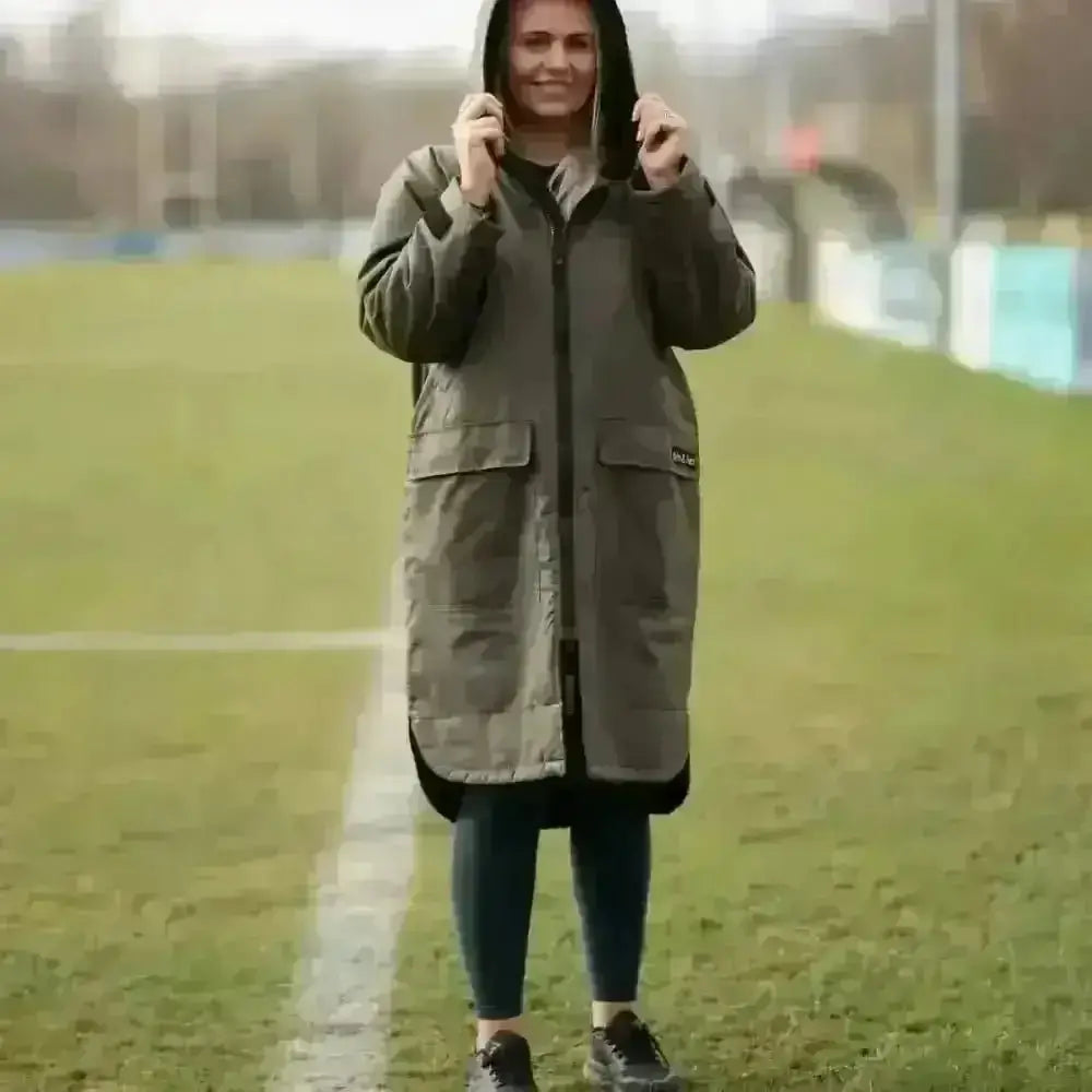 Olive green hooded changing robe parka with black accents and pockets