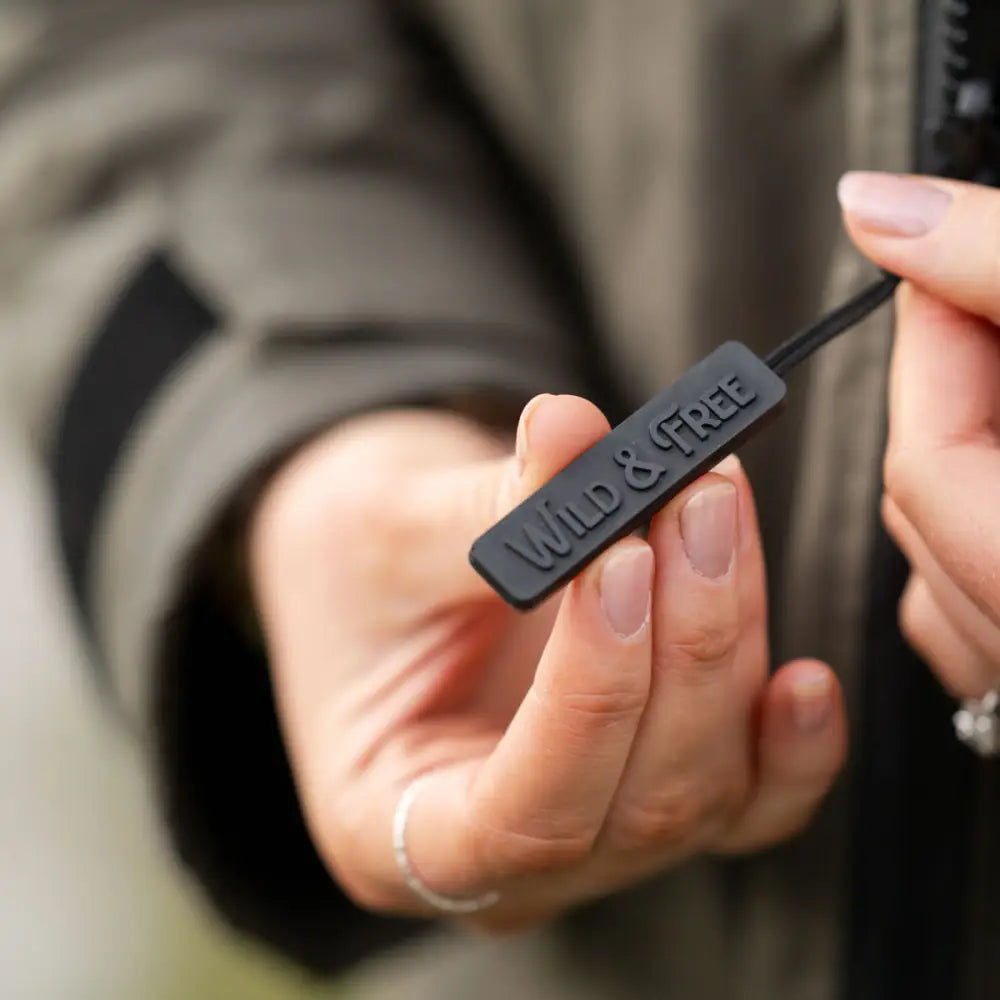 Black rubber lanyard with Wild & Free text for changing robe in Black Edition Olive Green