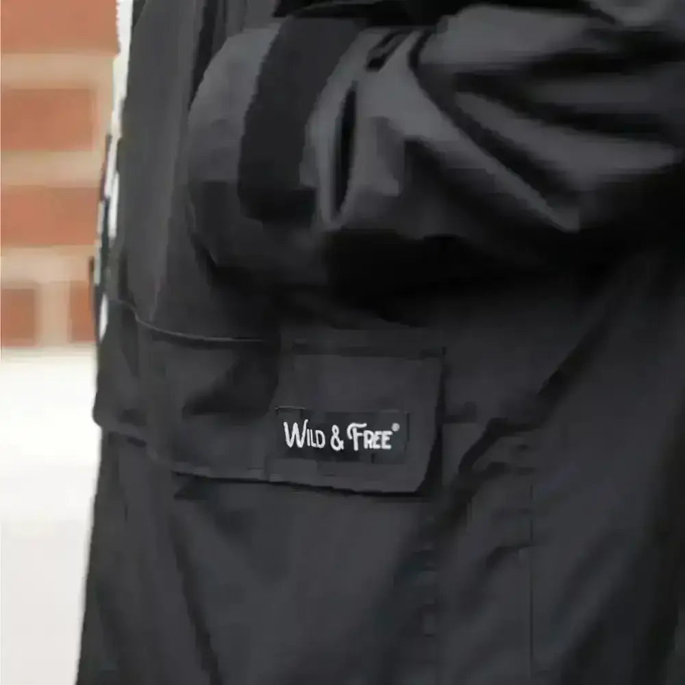 Black waterproof changing robe jacket with hood and Wild & Free logo