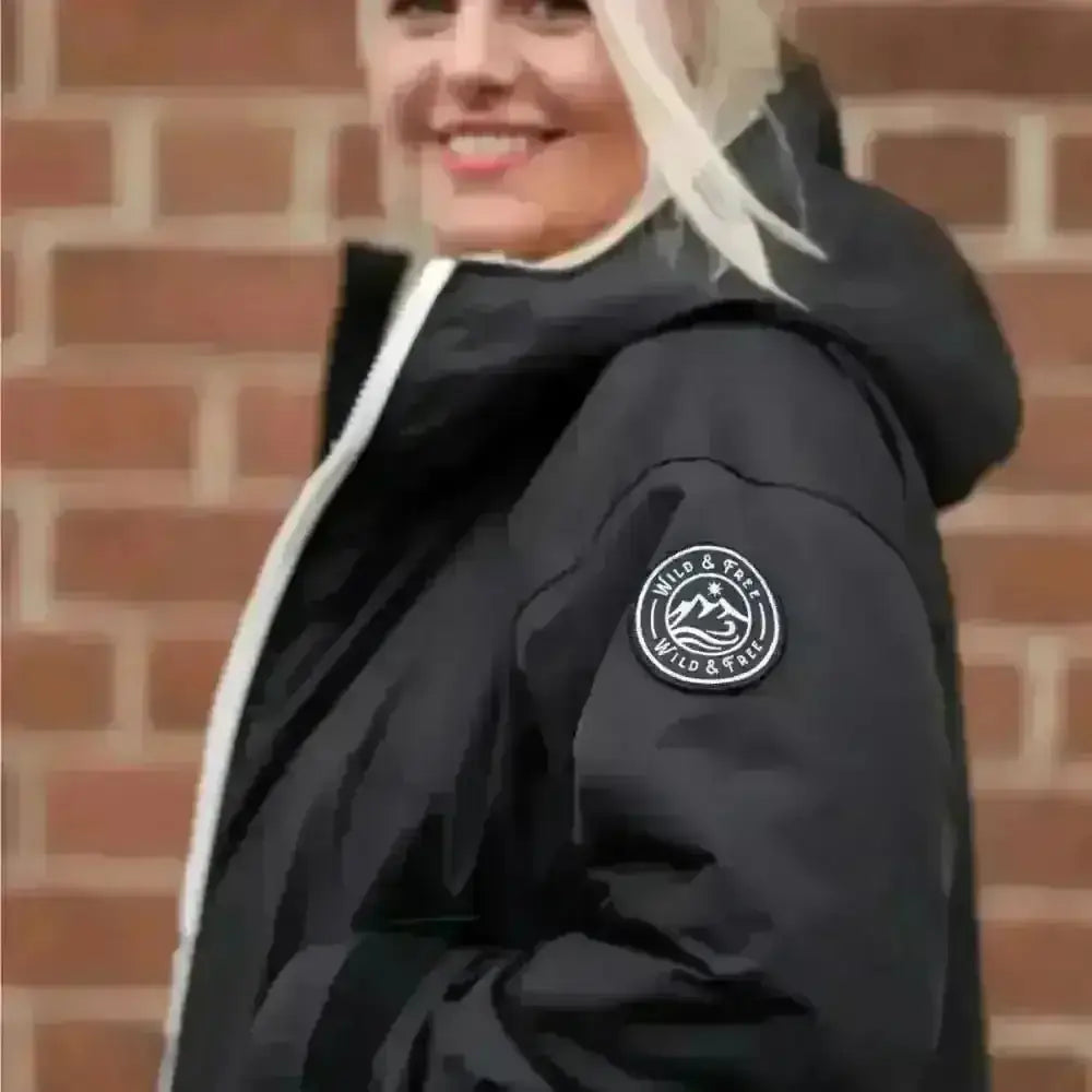 Black waterproof changing robe jacket with hood and white logo