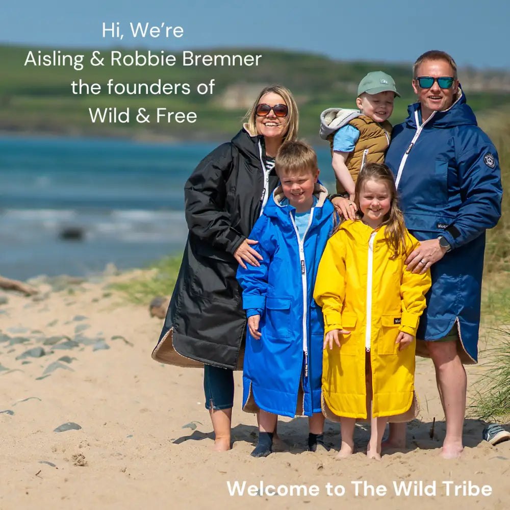 Black waterproof changing robe with yellow raincoat hood and drawstring