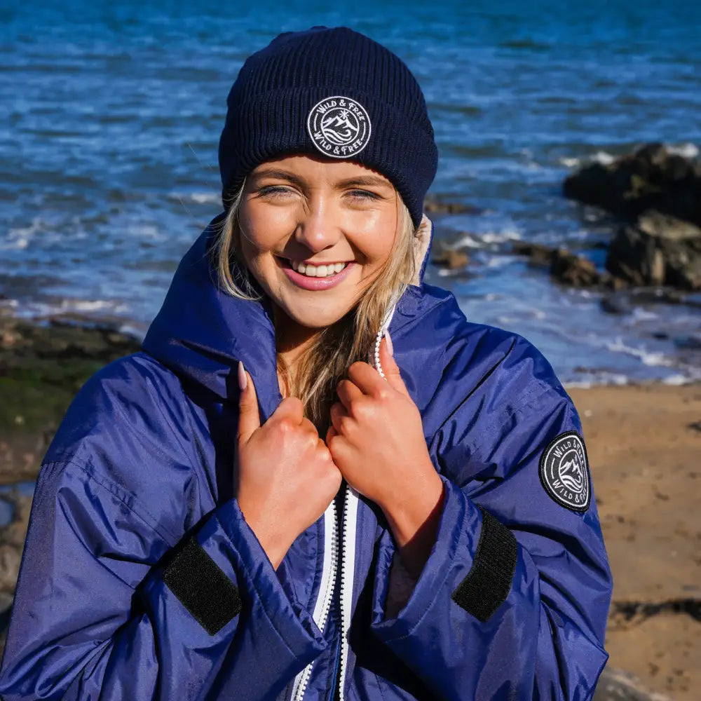 Navy Cobe changing robe with blue puffer jacket, hood, black accents