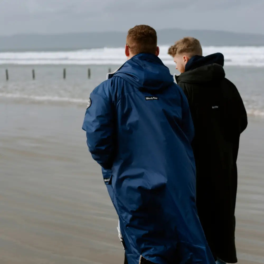 Navy Cobe changing robe: blue waterproof jacket with hood and white sleeve stripes