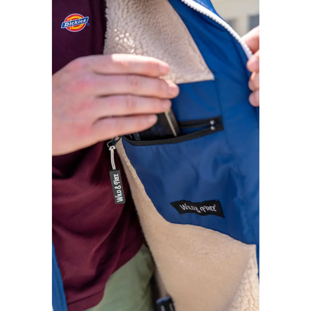 Navy Cobe changing robe: blue waterproof jacket with fleece lining and Dickies logo