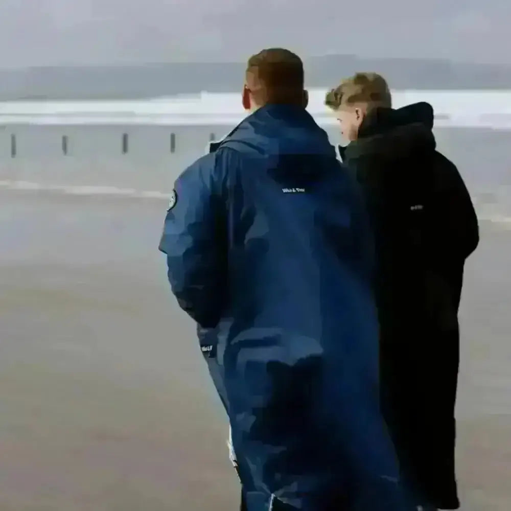 Navy Cobe changing robe: blue waterproof jacket with hood and white sleeve stripes