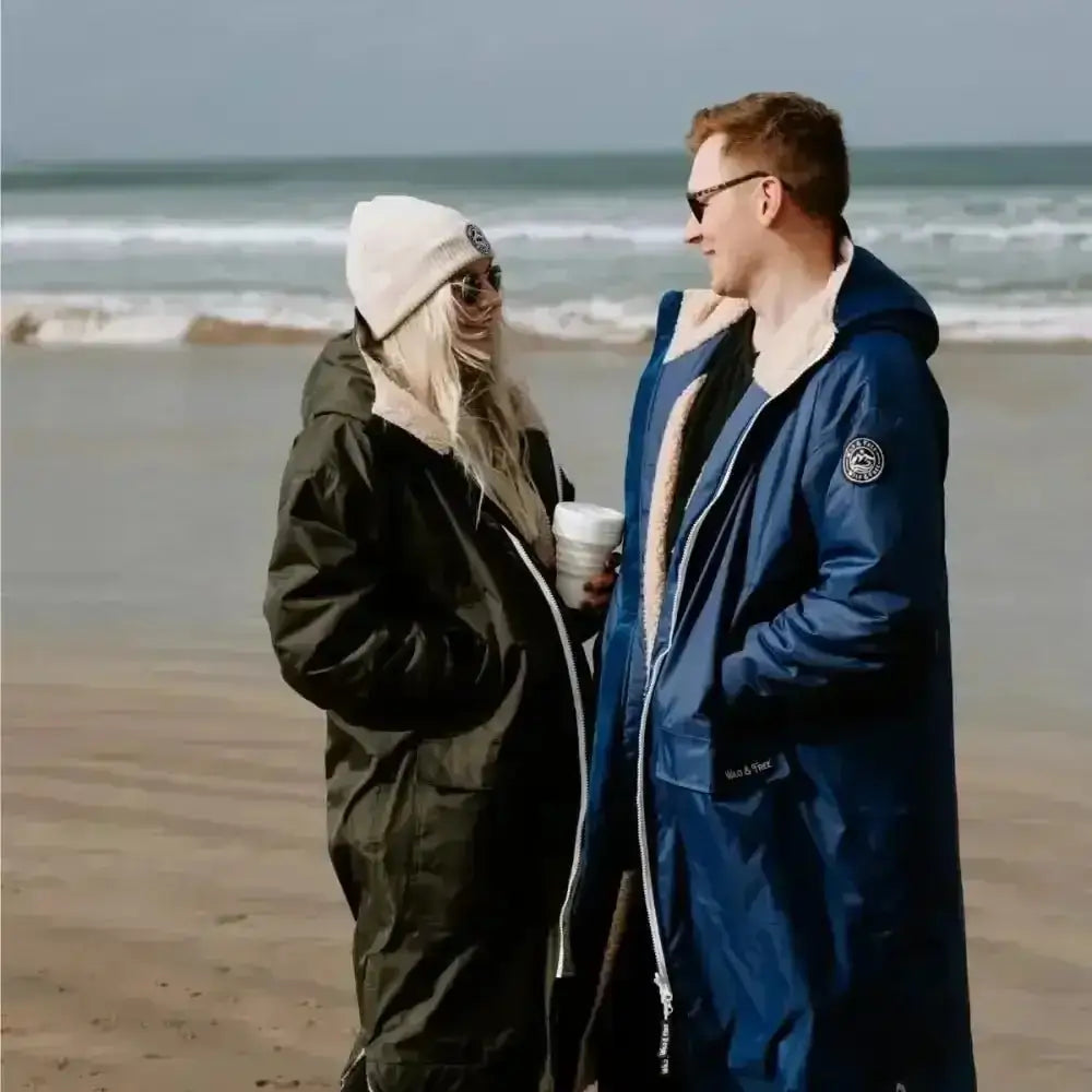 Olive green hooded changing robe parka with fur collar and beanie