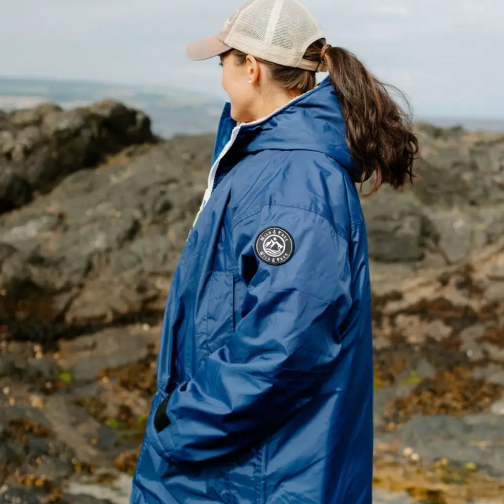 Navy Cobe changing robe: blue waterproof jacket with hood and logo patch