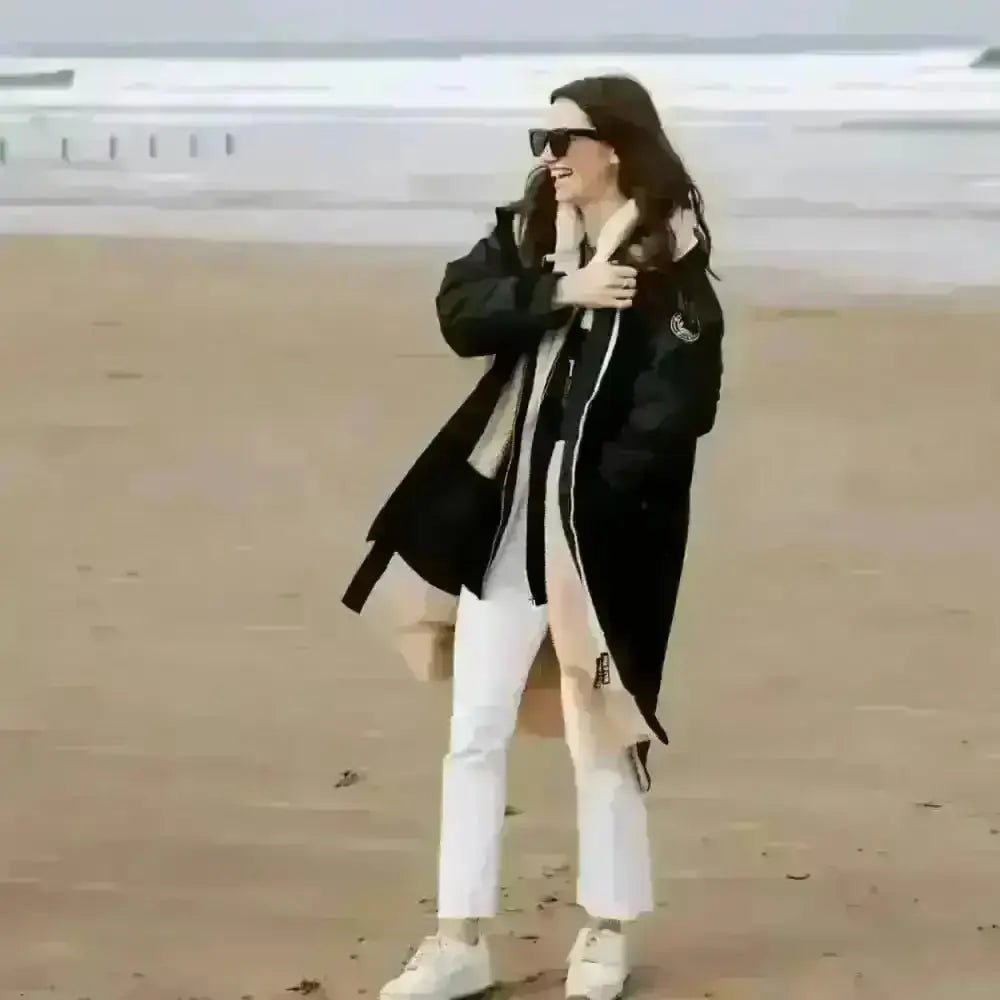 Black leather changing robe with fur-lined hood and zippers