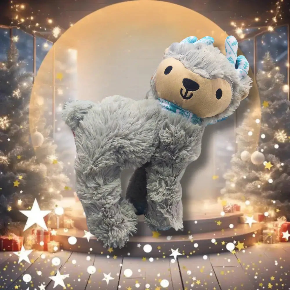 Plush toy Reindeer with a festive background featuring Christmas trees and lights.