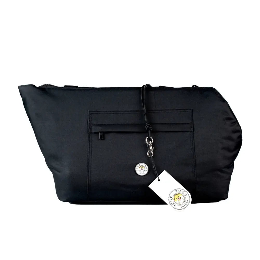 Black nylon Soho Poms pet carrier tote bag with silver hardware and white tag