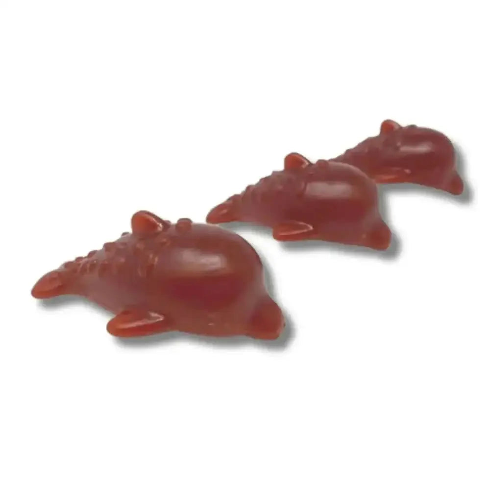 Red dinosaur gummy candy in Strawberry & Banana Dolphin Vegetable Chew For Dogs x 11