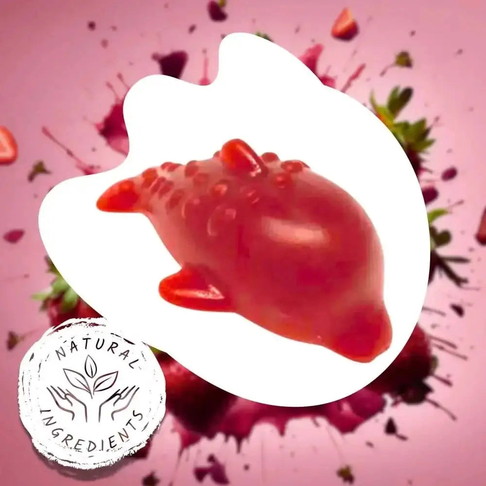 Glossy red strawberry gummy candy with white outline in Strawberry & Banana Dolphin Vegetable Chew For Dogs